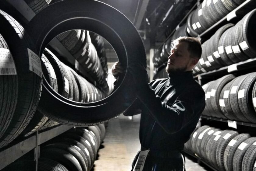 Mobile tyre fitting service Schofields technician repairing car tyre on site